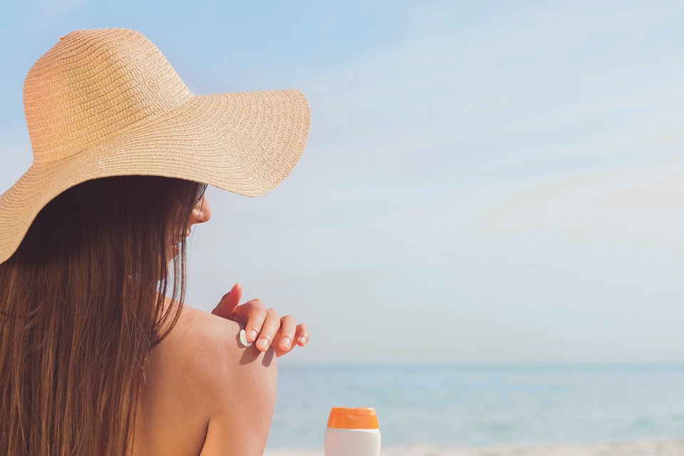 woman and sunscreen